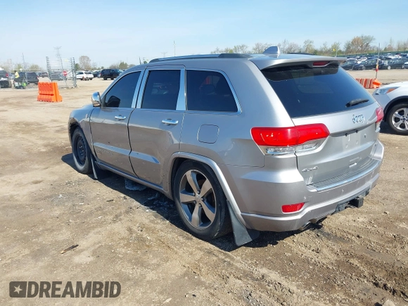2014 Jeep Grand Cherokee Overland with VIN 1C4RJFCT9EC231840, listed as a IAAI auction lot 42114284 with 170,691 mi miles and . Bid and sale history available at DreamBid. Image 3.