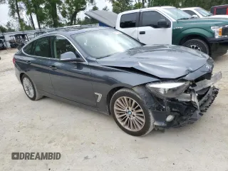2015 BMW 3 Series GT 328i Gran Turismo xDrive with VIN WBA3X5C51FD560458, listed as a Copart auction lot 51117855 with 131,250 mi miles and Non Repairable. Bid and sale history available at DreamBid. Image 4.