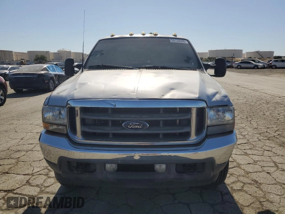 2002 Ford F-250 XL with VIN 1FTNW21L92ED10310, listed as a Copart auction lot 59132935 with 217,885 mi miles and Salvage title. Bid and sale history available at DreamBid. Image 5.