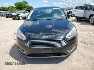 2018 Ford Focus Titanium with VIN 1FADP3J25JL233117, listed as a Copart auction lot 60458145 with 131,877 mi miles and Clean title. Bid and sale history available at DreamBid. Image 6.