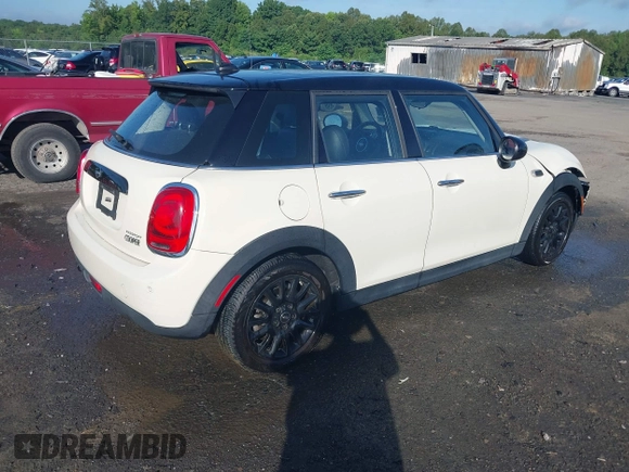 2019 MINI Hardtop 4 Door Cooper with VIN WMWXU1C5XK2J02832, listed as a IAAI auction lot 42525235 with 68,296 mi miles and . Bid and sale history available at DreamBid. Image 4.