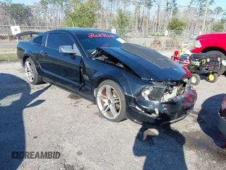 2006 Ford Mustang GT Deluxe z VIN 1ZVFT82H965131407, wystawiony jako IAAI lot #41631990 z przebiegiem 123 851 mil mil oraz . Historia ofert i sprzedaży dostępna na DreamBid. Obrazek 1.