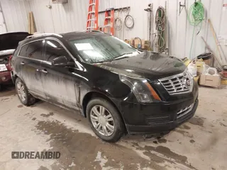 2014 Cadillac SRX Luxury Collection with VIN 3GYFNBE38ES518247, listed as a IAAI auction lot 41475294 with Not Provided miles and . Bid and sale history available at carsss.com. Image 1.