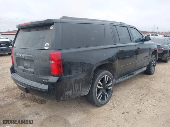 2018 Chevrolet Suburban Premier with VIN 1GNSCJKC3JR253802, listed as a IAAI auction lot 41442438 with 151,781 mi miles. Bid and sale history available at carsss.com. Image 4.