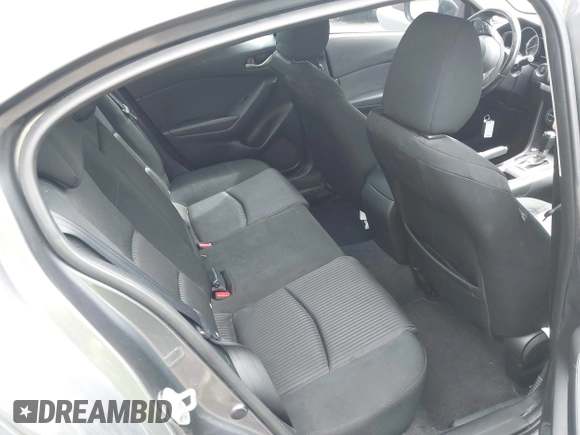 2014 Mazda 3 i Touring with VIN JM1BM1V72E1119890, listed as a IAAI auction lot 42531252 with 124,398 mi miles and . Bid and sale history available at DreamBid. Image 8.