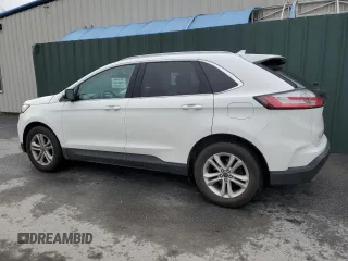 2020 Ford Edge SEL z VIN 2FMPK3J90LBB01559, wystawiony jako Copart lot #61365305 z przebiegiem 120 050 mil mil oraz Czysty tytuł • Clean title. Historia ofert i sprzedaży dostępna na DreamBid. Obrazek 2.