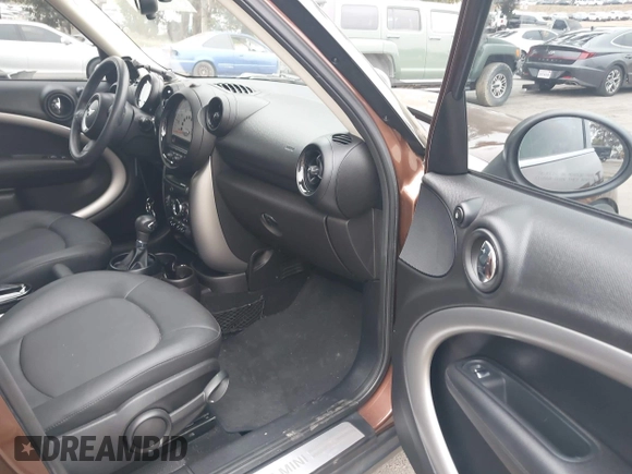2013 MINI Countryman with VIN WMWZB3C56DWM09484, listed as a IAAI auction lot 42039954 with 37,264 mi miles and . Bid and sale history available at DreamBid. Image 5.