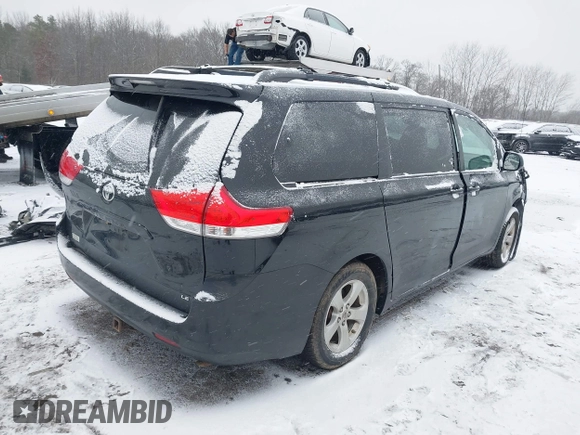 2011 Toyota Sienna LE AAS with VIN 5TDKK3DC3BS113594, listed as a IAAI auction lot 41236977 with 166,156 mi miles. Bid and sale history available at carsss.com. Image 4.