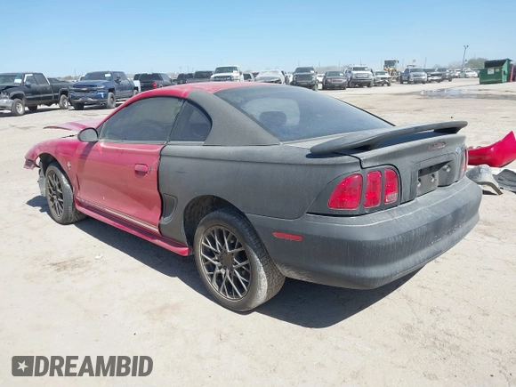 1997 Ford Mustang with VIN 1FALP4044VF195081, listed as a IAAI auction lot 41725150 with 124,009 mi miles. Bid and sale history available at carsss.com. Image 3.