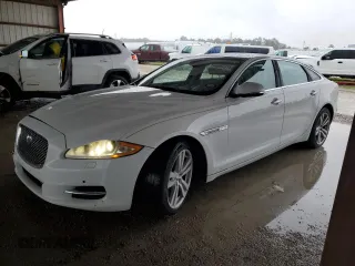 2013 Jaguar XJ Portfolio with VIN SAJWJ2GD4D8V47695, listed as a Copart auction lot 44997315 with 195,810 mi miles and Salvage Title. Bid and sale history available at DreamBid. Image 1.