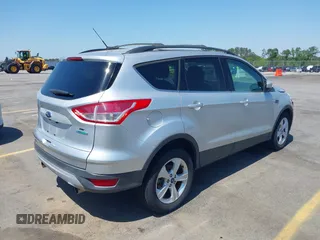 2013 Ford Escape SE with VIN 1FMCU0GX0DUA19811, listed as a IAAI auction lot 42009015 with 135,662 mi miles. Bid and sale history available at carsss.com. Image 4.