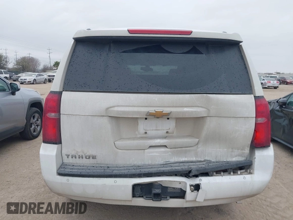 2015 Chevrolet Tahoe LS with VIN 1GNSCAEC2FR641252, listed as a IAAI auction lot 41528667 with 183,796 mi miles and . Bid and sale history available at DreamBid. Image 16.