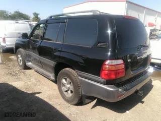 2001 Toyota Land Cruiser with VIN JTEHT05J512016563, listed as a IAAI auction lot 41868193 with 247,653 mi miles. Bid and sale history available at carsss.com. Image 3.