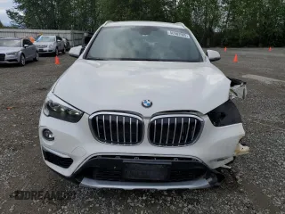 2016 BMW X1 xDrive28i z VIN WBXHT3C37GP882189, wystawiony jako Copart lot #56983985 z przebiegiem 45 700 mil mil oraz Szkoda całkowita • Salvage title. Historia ofert i sprzedaży dostępna na DreamBid. Obrazek 5.
