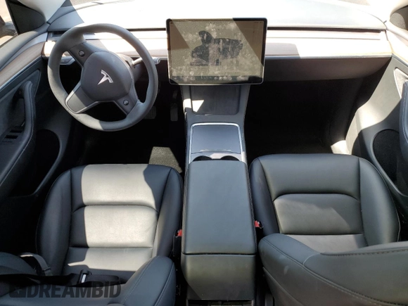 2023 Tesla Model Y Long Range with VIN 7SAYGDEE5PF850358, listed as a Copart auction lot 52581615 with 19,376 mi miles and Salvage Title. Bid and sale history available at DreamBid. Image 8.