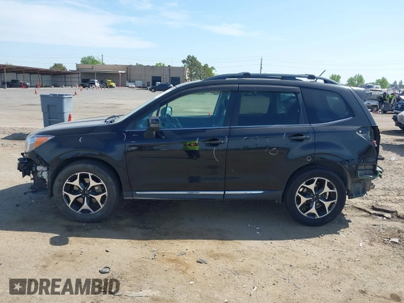 2015 Subaru Forester XT Touring with VIN JF2SJGUC5FH822632, listed as a IAAI auction lot 42032965 with 118,111 mi miles and . Bid and sale history available at DreamBid. Image 15.
