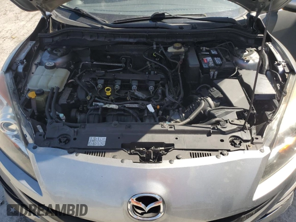 2011 Mazda 3 i Touring z VIN JM1BL1VF4B1370996, wystawiony jako Copart lot #58240445 z przebiegiem 143 634 mil mil oraz Czysty tytuł • Clean title. Historia ofert i sprzedaży dostępna na DreamBid. Obrazek 11.