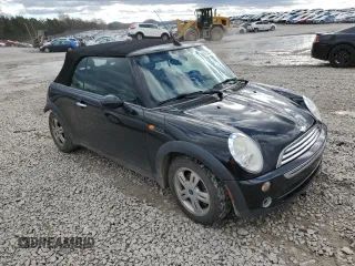 2005 MINI Convertible with VIN WMWRF33485TG11549, listed as a Copart auction lot 87285984 with 58,934 mi miles and Salvage title. Bid and sale history available at DreamBid. Image 4.