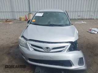 2013 Toyota Corolla L with VIN 5YFBU4EE8DP161765, listed as a IAAI auction lot 42109708 with 105,931 mi miles and . Bid and sale history available at DreamBid. Image 13.