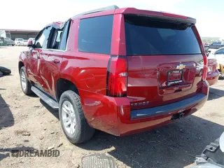 2018 Chevrolet Tahoe LT with VIN 1GNSKBKC6JR215585, listed as a IAAI auction lot 42043898 with 85,730 mi miles and . Bid and sale history available at DreamBid. Image 3.