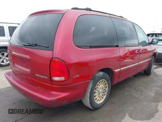 1998 Chrysler Town & Country LXi with VIN 1C4GP64L8WB589426, listed as a IAAI auction lot 41535344 with 132,466 mi miles. Bid and sale history available at carsss.com. Image 4.