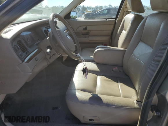 2005 Ford Crown Victoria LX z VIN 2FAFP74WX5X166506, wystawiony jako Copart lot #52141265 z przebiegiem 117 686 mil mil oraz Szkoda całkowita • Salvage title. Historia ofert i sprzedaży dostępna na DreamBid. Obrazek 7.