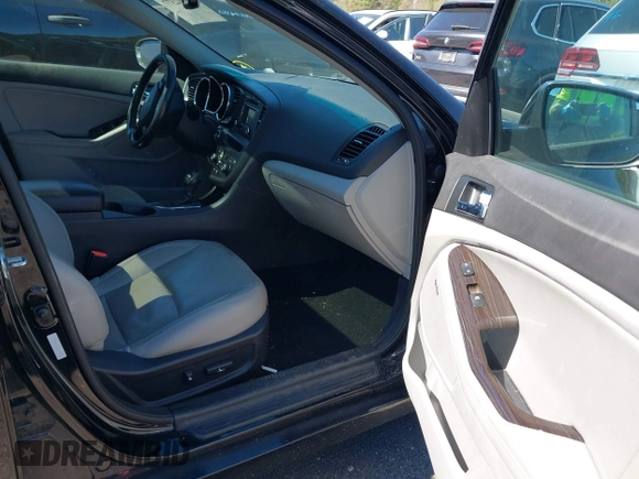 2013 Kia Optima EX with VIN 5XXGN4A77DG216998, listed as a IAAI auction lot 42102377 with 204,354 mi miles. Bid and sale history available at carsss.com. Image 5.