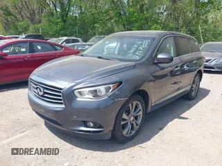 2013 Infiniti JX35 with VIN 5N1AL0MM1DC306701, listed as a IAAI auction lot 42131992 with 177,357 mi miles. Bid and sale history available at carsss.com. Image 2.
