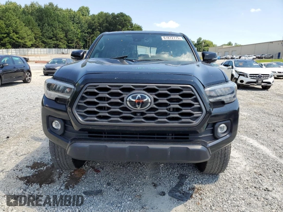 2023 Toyota Tacoma SR with VIN 3TMCZ5AN3PM571922, listed as a Copart auction lot 61872775 with 34,501 mi miles and Salvage title. Bid and sale history available at DreamBid. Image 5.