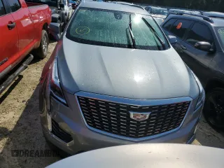 2023 Cadillac XT5 FWD Luxury z VIN 1GYKNAR4XPZ144533, wystawiony jako Copart lot #74734164 z przebiegiem Nie podano mil oraz Nie do naprawy • Non repairable. Historia ofert i sprzedaży dostępna na DreamBid. Obrazek 5.
