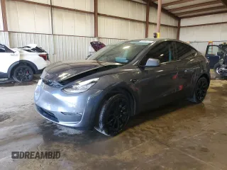 2022 Tesla Model Y Long Range z VIN 7SAYGAEE2NF573843, wystawiony jako Copart lot #53995955 z przebiegiem 50 445 mil mil oraz Szkoda całkowita • Salvage title. Historia ofert i sprzedaży dostępna na DreamBid. Obrazek 1.