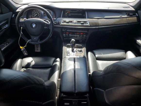 2013 BMW 7 Series 750i with VIN WBAYA8C54DC996412, listed as a Copart auction lot 56982895 with 124,258 mi miles and Salvage title. Bid and sale history available at DreamBid. Image 8.