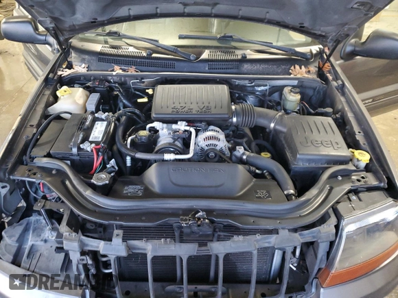 2004 Jeep Grand Cherokee Limited with VIN 1J8GX58N84C330702, listed as a Copart auction lot 84808454 with 164,426 mi miles and Salvage Title. Bid and sale history available at DreamBid. Image 12.
