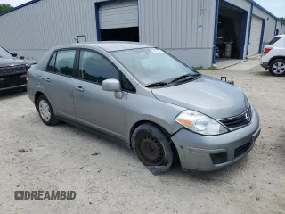 2011 Nissan Versa S with VIN 3N1BC1AP1BL435829, listed as a Copart auction lot 54223355 with 123,071 mi miles and Clean title. Bid and sale history available at DreamBid. Image 4.