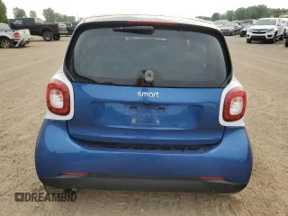 2016 Smart fortwo Passion z VIN WMEFJ5DA9GK062214, wystawiony jako Copart lot #61179715 z przebiegiem 58 152 mil mil oraz Czysty tytuł • Clean title. Historia ofert i sprzedaży dostępna na DreamBid. Obrazek 6.
