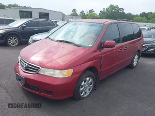2002 Honda Odyssey EX with VIN 5FNRL18622B016265, listed as a IAAI auction lot 42294568 with 231,703 mi miles and . Bid and sale history available at DreamBid. Image 2.