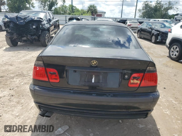 2002 BMW 3 Series 330i with VIN WBAEV53472KM01777, listed as a Copart auction lot 70984764 with 105,293 mi miles and Salvage Title. Bid and sale history available at carsss.com. Image 6.