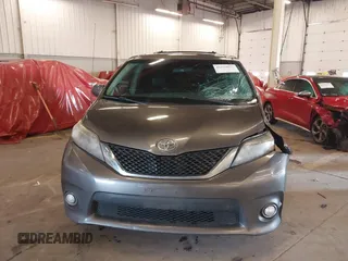 2011 Toyota Sienna SE with VIN 5TDXK3DC7BS034516, listed as a IAAI auction lot 41539955 with 209,309 mi miles. Bid and sale history available at carsss.com. Image 12.