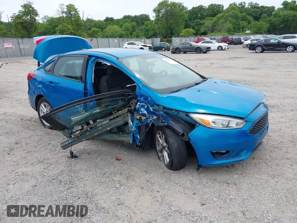 2015 Ford Focus SE z VIN 1FADP3F26FL252212, wystawiony jako IAAI lot #42345763 z przebiegiem 102 549 mil mil oraz . Historia ofert i sprzedaży dostępna na DreamBid. Obrazek 1.