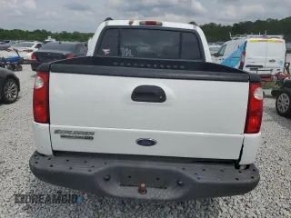 2005 Ford Explorer Sport Trac XLS with VIN 1FMZU67K85UA59170, listed as a Copart auction lot 54472775 with 227,225 mi miles and Salvage title. Bid and sale history available at DreamBid. Image 6.