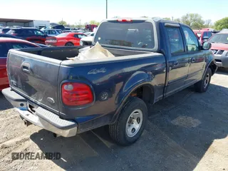 2001 Ford F-150 SuperCrew XLT with VIN 1FTRW08W81KF01853, listed as a IAAI auction lot 41850493 with 1 mi miles. Bid and sale history available at carsss.com. Image 4.