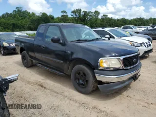 1999 Ford F-150 with VIN 1FTZX1720XKA84187, listed as a Copart auction lot 61401055 with Not provided miles and Salvage title. Bid and sale history available at DreamBid. Image 4.