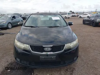 2010 Kia Forte EX with VIN KNAFU4A28A5050734, listed as a IAAI auction lot 42063165 with 179,284 mi miles. Bid and sale history available at carsss.com. Image 12.