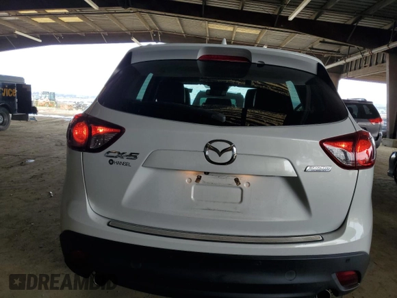 2014 Mazda CX-5 Grand Touring with VIN JM3KE2DY5E0383597, listed as a Copart auction lot 50205545 with 110,052 mi miles and Salvage Title. Bid and sale history available at carsss.com. Image 6.