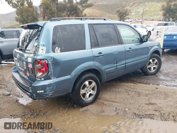 2007 Honda Pilot EX with VIN 2HKYF18437H528868, listed as a IAAI auction lot 41762030 with 203,212 mi miles. Bid and sale history available at carsss.com. Image 4.