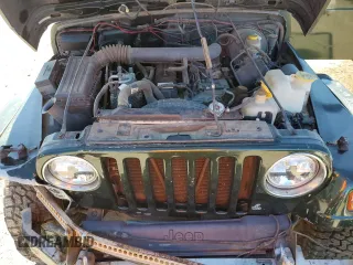 1997 Jeep Wrangler Sahara with VIN 1J4FY49S6VP521988, listed as a Copart auction lot 80753494 with 99,909 mi miles and Salvage Title. Bid and sale history available at carsss.com. Image 11.