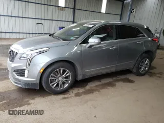 2023 Cadillac XT5 AWD Premium Luxury with VIN 1GYKNDRS8PZ202591, listed as a Copart auction lot 49792945 with 57,333 mi miles and Clean Title. Bid and sale history available at DreamBid. Image 1.