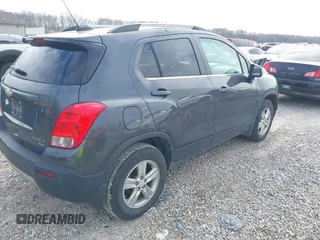 2016 Chevrolet Trax LT with VIN 3GNCJPSB2GL164579, listed as a IAAI auction lot 40984794 with 114,717 mi miles. Bid and sale history available at carsss.com. Image 4.