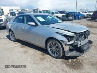 2019 Cadillac CTS Luxury AWD z VIN 1G6AX5SX8K0143601, wystawiony jako IAAI lot #42045153 z przebiegiem 17 682 mil mil oraz . Historia ofert i sprzedaży dostępna na DreamBid. Obrazek 1.