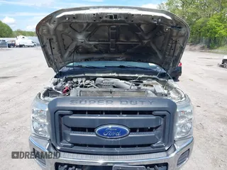 2014 Ford F-250 XL with VIN 1FTBF2B61EEA36052, listed as a IAAI auction lot 41936441 with 65,916 mi miles and . Bid and sale history available at DreamBid. Image 6.